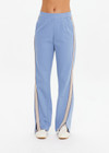 THE UPSIDE women's blue Petra Flare Pant is made from a sustainable lenzing viscose material that features a contrast white knitted tape down the sides. This track pant features an elasticated waist and side pockets.