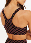 THE UPSIDE women's recycled peached black and chocolate check Technica Jade Bra is a full coverage sports bra with extra support and includes removable cups. Perfect for yoga, pilates & barre.
