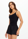 THE UPSIDE women's Black recycled peached Tani Scoop Tank Top features fine elasticated straps with inner shelf bra and removable cups. The perfect wardrobe staple.