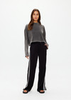 THE UPSIDE women's black Roma Pant is high-waisted with a elasticated waistband with drawcord, contrast cream stripes down sides and front & back pockets. The perfect everyday pant.