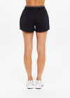 THE UPSIDE women's black Lucky Run Short features a elasticated waistband, a slightly curved hem, internal inner short for full coverage and invisble zip pockets. Made for running.