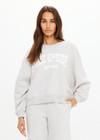 THE UPSIDE women's grey Paloma Crew offers a relaxed fit with drop shoulder and The Upside logo printed on front chest. The perfect everyday jumper.