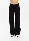 THE UPSIDE women's black organic cotton Willow Wide Leg Pant is a high-waisted, relaxed fit and features an elasticated waistband with drawcord and side seam pockets. Made for lifestyle.