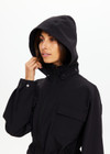 THE UPSIDE women's black Freddie Fleece Lined Anorak is made from bonded water resistant fabric with internal warm polar fleece and features external pockets with flap closure and drawcord with toggles to cinch in waist.