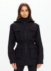 THE UPSIDE women's black Freddie Fleece Lined Anorak is made from bonded water resistant fabric with internal warm polar fleece and features external pockets with flap closure and drawcord with toggles to cinch in waist.