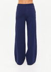 THE UPSIDE women’s navy Ananda Wide Leg Cody Pant is a true-to-size fit and features an elasticated waistband, side pockets and knitted stripes down sleeves. The perfect everyday piece.