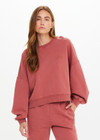 THE UPSIDE women’s red organic cotton Serendipity Paloma Crew is designed for a boxy fit and features drop shoulders and The Upside logo puff printed at the front. Made for everyday.