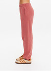 THE UPSIDE women’s red organic cotton Serendipity Harrison Track is a true-to-size fit and features an elasticated waistband and side seam pockets. Made for everyday.