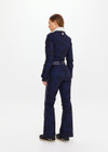 THE UPSIDE women’s navy Hakuba Kiki Ski Suit is a long sleeve full-length ski suit and features a zip opening, an elasticated removable belt and bonded fleece underside for extra warmth. Designed for Après-ski and winter wear.