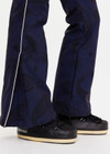 THE UPSIDE women’s navy Hakuba Kiki Ski Suit is a long sleeve full-length ski suit and features a zip opening, an elasticated removable belt and bonded fleece underside for extra warmth. Designed for Après-ski and winter wear.