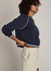 THE UPSIDE women’s navy organic cotton Astra Paloma Crew offers an oversized fit and features an embroidered horseshoe logo on front in navy. Made for lifestyle.
