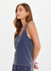 THE UPSIDE women's blue recycled cotton Soho Kapri Racerback Tank has a relaxed fit with fabric-covered buttons at the scoop neck. Made for lifestyle.