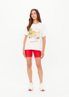 THE UPSIDE women's organic cotton creme Feeling Lucky Jodhi Tee features a classic shape and Feeling Lucky graphic printed on the front chest. Made for everyday wear.