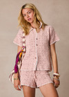 THE UPSIDE women's pink organic cotton Anoki Lovett Crochet Shirt has a relaxed fit with cream scalloped edges and pink pearlised shell buttons. Perfect for travel or everyday.
