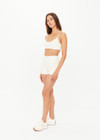 THE UPSIDE women’s cream recycled peached Volant Scoop Danni Bra is designed for a soft & supportive fit and features a scoop neckline and adjustable straps. Made for yoga & pilates.