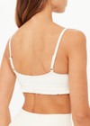 THE UPSIDE women’s cream recycled peached Volant Scoop Danni Bra is designed for a soft & supportive fit and features a scoop neckline and adjustable straps. Made for yoga & pilates.
