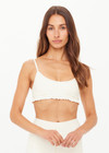 THE UPSIDE women’s cream recycled peached Volant Scoop Danni Bra is designed for a soft & supportive fit and features a scoop neckline and adjustable straps. Made for yoga & pilates.