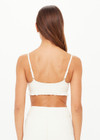THE UPSIDE women’s cream recycled peached Volant Scoop Danni Bra is designed for a soft & supportive fit and features a scoop neckline and adjustable straps. Made for yoga & pilates.