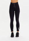 THE UPSIDE women’s black recycled peached Celestia 25inch Legging is a soft & supportive fit and features a drawcord and printed star and horseshoe on ankles. Made for yoga & pilates.