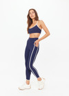 THE UPSIDE women’s navy recycled peached Samara Bowie Bra offers a soft & supportive fit and features a scooped front neckline with crossback and removable cups. Made for yoga & pilates.