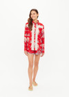 THE UPSIDE women's red Palma Bobbi Collared Shirt features sleeve plackets, pearlised buttons, and cream crochet lace panels. Perfect for travel or lifestyle.
