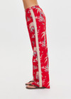 THE UPSIDE women's red Palma Sierra Wide Leg Pant features cream contrast panels, turquoise piping, soft elastic waistband, and side pockets. Perfect for travel or lifestyle.