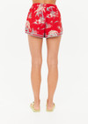 THE UPSIDE women's red Palma Klio Short features contrast turquoise binds on curved hem and waist drawcord with antique brass cord ends. Perfect for travel or everyday.