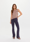 THE UPSIDE women's monogram jacquard Ezra Florence Flare is high-rise with a firm & supportive fit, featuring a V panel waistband and side seam split at hem. Made for yoga and pilates.