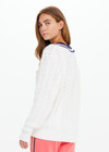 THE UPSIDE women’s cream organic cotton Espada Louie V Neck Sweater is a regular, chunky cable knit design with a navy and rose striped neckline. Made for everyday.