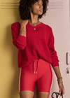 THE UPSIDE women's red organic cotton Fenway Sebastion Knit Crew has a relaxed fit with ribbed neckline and cuffs, and a logo knit detail on the back. Made for everyday wear.
