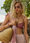THE UPSIDE women's pink check Aliki Heidi Bra offers a supportive, comfortable fit with balconette shape, underwire, and metal back clip. Made for swim.