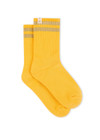 THE UPSIDE women’s yellow Curio Crew Sock with jaquard stripes in gold metallic yarn.