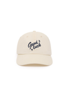 THE UPSIDE women’s cream Good Luck Soft Cap features an embroidered 'Good Luck' on front with an adjustable strap at the back.