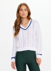 THE UPSIDE women’s white Citta Sonny V Neck Sweater is a fitted, chevron-knit design in organic cotton. The perfect wardrobe addition.