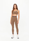 THE UPSIDE women’s recycled mocha Form Seamless 25In Legging offers a supportive fit with a soft ribbed waistband and moisture control. Made for yoga and pilates.