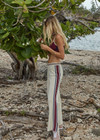 THE UPSIDE women’s creme Adesa Kansas Knit Pant is a wide-leg style featuring short hem splits and a soft elastic waistband. Made for lifestyle.