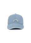 THE UPSIDE women's blue cotton Washed Denim Soft Cap offers a soft, retro fit with an embroidered cream horseshoe logo and an adjustable back strap. Made for everyday wear.