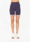 THE UPSIDE women's monogram jacquard Ezra 5inch High Spin Short is high-rise with a V panel waistband. Made for yoga and pilates.
