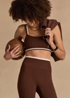 THE UPSIDE women's brown Form Seamless Anita Bra is designed for a firm & supportive fit and features a double layer with white underlayer. Made for yoga & pilates.