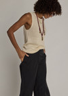 THE UPSIDE women's natural linen Knitted Tara Tank Top is designed for a relaxed fit and features an arrow logo at hem. Made for everyday wear.