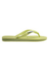 THE UPSIDE women's green Havaiana Brazil Logo has a slip-on design, made from flexible Brazilian rubber and features flag pin detail. Made for everyday wear.