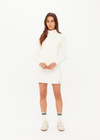 THE UPSIDE women's cream Courtship Dova Run Top is a form fitting long-sleeve and features a quarter zip opening with mock neck, thumb holes and invisible zip pockets. Made for running.