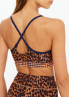 THE UPSIDE women's leopard Malawi Badu Crossback Bra offers soft & supportive fit with a scooped front neckline, crossback straps and removable cups. Made for yoga & pilates.