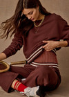 THE UPSIDE women's brown organic cotton Toluca Willow Wide Leg Pant is high-waisted and features a cream striped ribbed waistband and side seam pockets. Made for everyday.