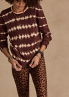 THE UPSIDE women's brown & cream tie dye organic cotton Amana Long Sleeve Knit is designed for a relaxed fit and features a contrast striped neckline in orange. Made for everyday.
