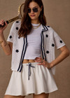 THE UPSIDE women's white tennis, pickleball & padel Daria Skort is made from organic cotton and features an internal short with elasticated waistband and drawcord.