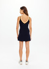 THE UPSIDE women's white organic cotton tennis Riley Knit Dress is designed for a slim fit and features wide straps and a V neckline with white stripes down the side.