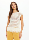 THE UPSIDE women's natural organic cotton Kamali Knit Fringe Top has a loose, boxy fit with scooped low back and knitted fringe detailing at hem. Made for lifestyle.