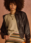 THE UPSIDE women's brown Zariah Bomber Jacket, made from soft vegan leather fabrication, is a regular fit and features a zip-through front and patch pockets. Made for lifestyle.