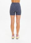 THE UPSIDE women's navy jacquard Secretos 4inch High Spin Short is high-rise and offers a soft & supportive fit in a textured floral and metallic fabrication. Made for yoga & pilates.